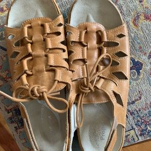 Size 7.5 tan sandals by Prope’t. Worn once. Velcro back sling strap.